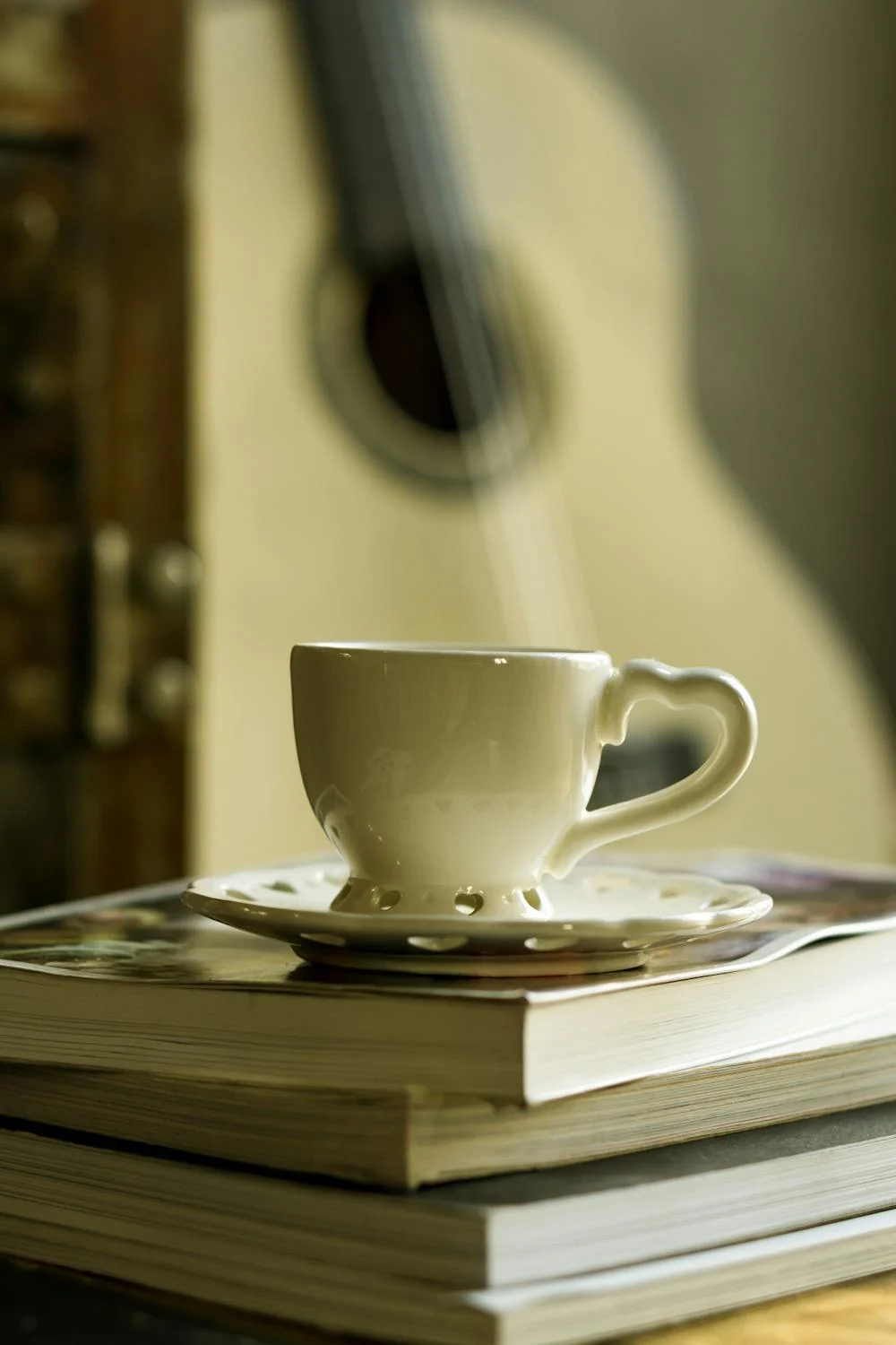 White cup with hearts