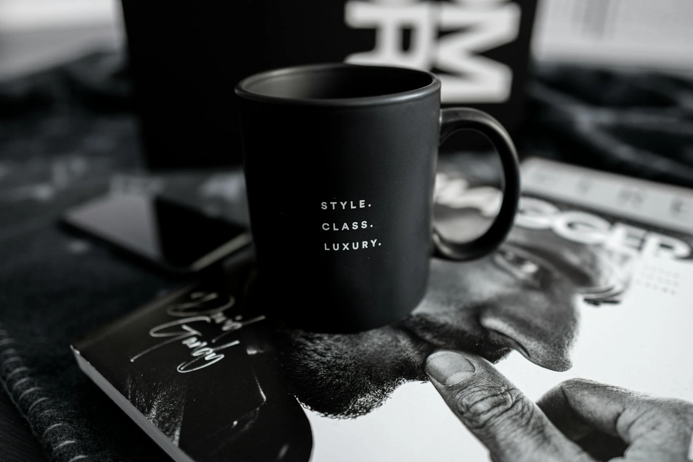 black and white coffee and magazine